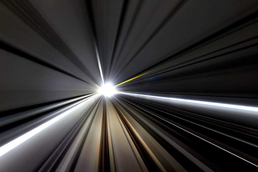 Lights from speeding in a vehicle through a tunnel